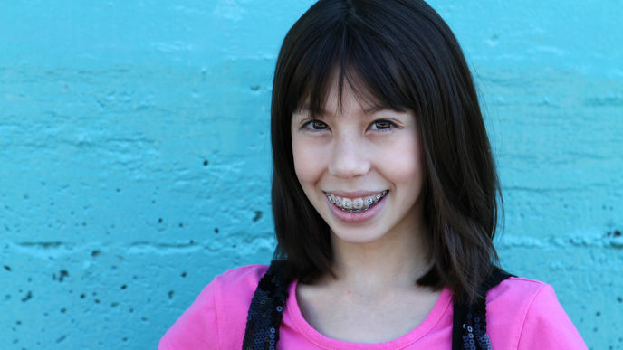 A girl wearing braces